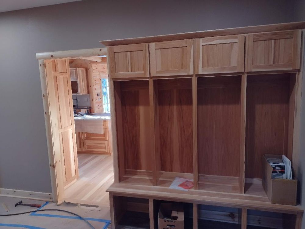 Custom mudroom cubbies and built-in storage wall